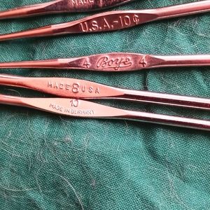 Vintage crochet or tatting hooks.